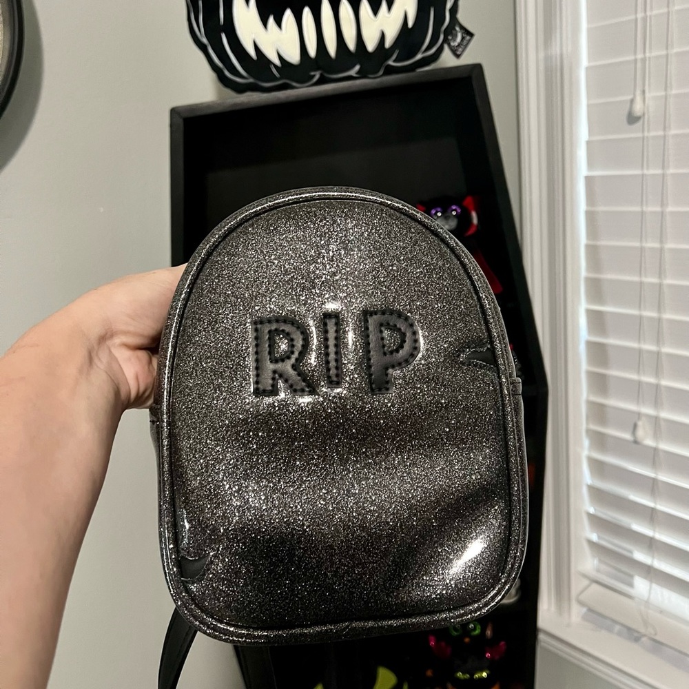 Love pain and stitches small tombstone RIP backpack. Brand new never used.